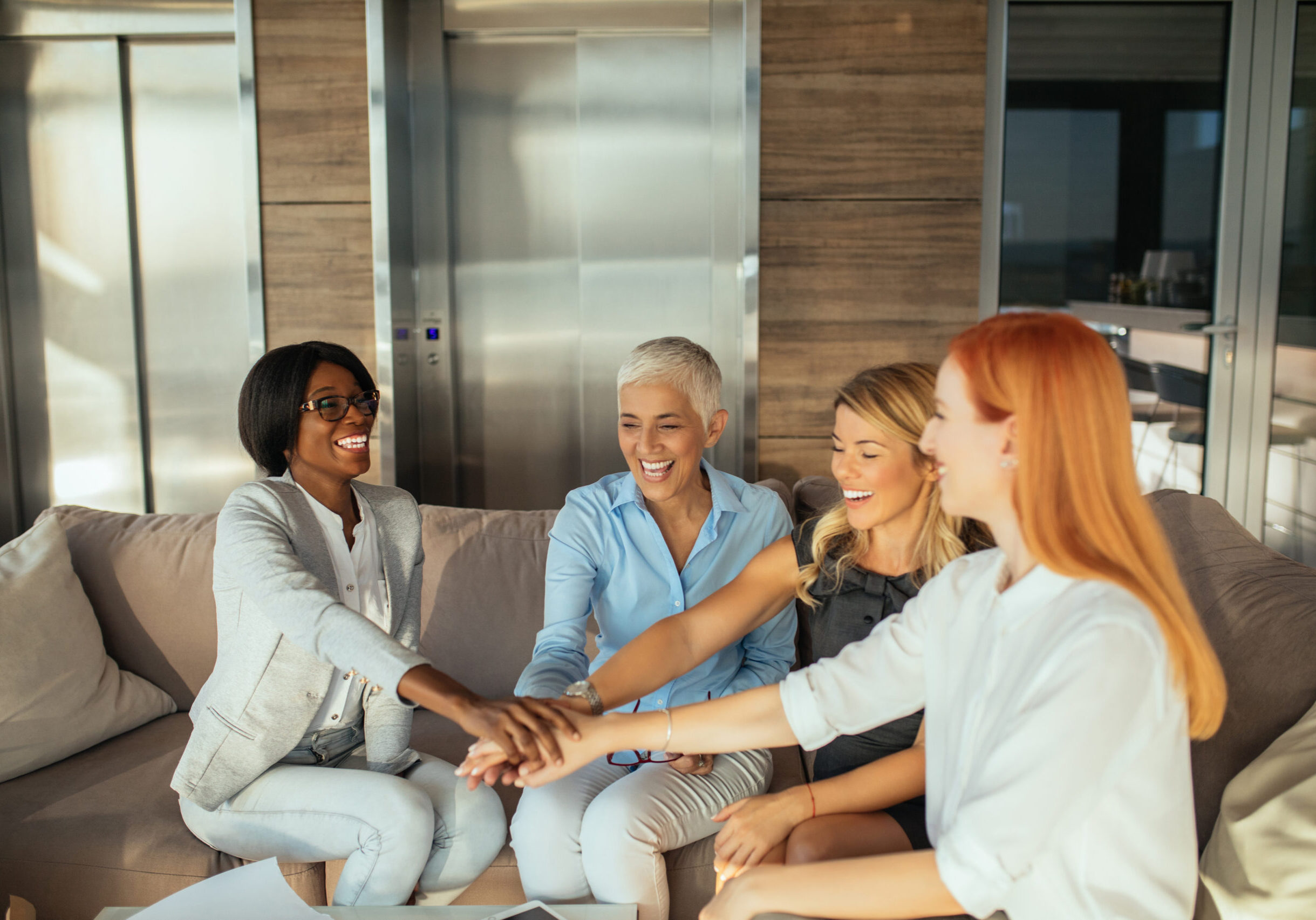 The best team Business women made an agreement about the new project in the office.